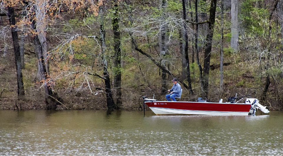 Man fishing from a boat in Alabama