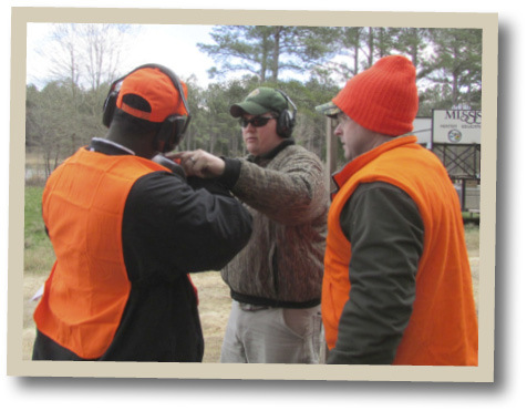 Instructor and Students in a Hunter Education Course