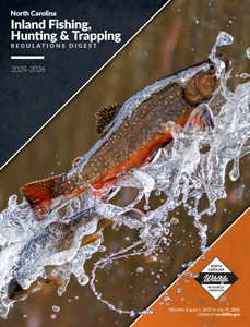 Cover of the 2025–2026 North Carolina Inland Fishing, Hunting & Trapping Regulations Digest featuring a brook trout leaping out of splashing water.