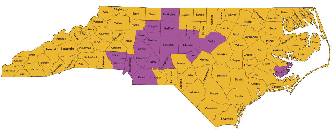 Color-coded map of North Carolina showing counties where hunting bears with dogs is allowed or restricted. Purple counties indicate areas with specific regulations or restrictions, while yellow counties show where bear hunting with dogs is permitted.