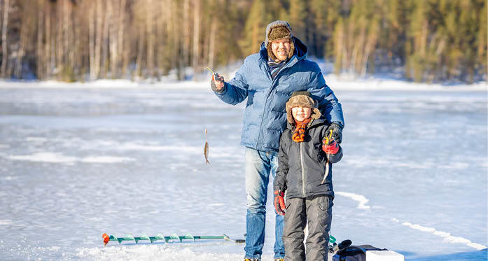Family ice fishing together.