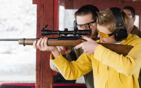 Individuals Practicing at Shooting Range
