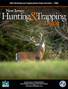 Cover of the New Jersey 2025–2026 Hunting & Trapping Digest featuring a white-tailed buck standing in a field and looking upward near the forest edge.