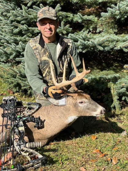 Paul D. with a white-tailed deer he harvested while hunting in Wayne County, New York. Photo taken by Anthony F. 