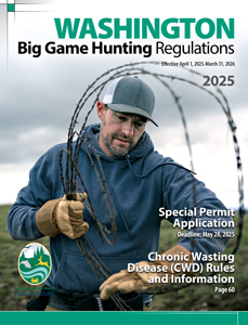 Cover of the 2025 Washington Big Game Hunting Regulations guide showing a hunter handling barbed wire fencing outdoors.